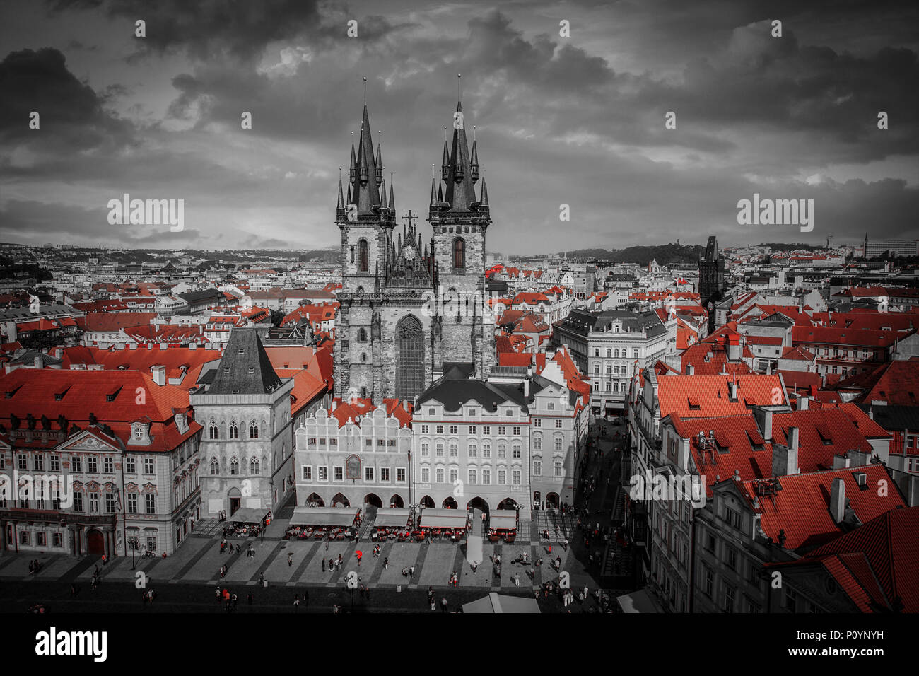 Prague Old town square, Tyn Cathedral. under sunlight. black and white photo with red color. Stock Photo