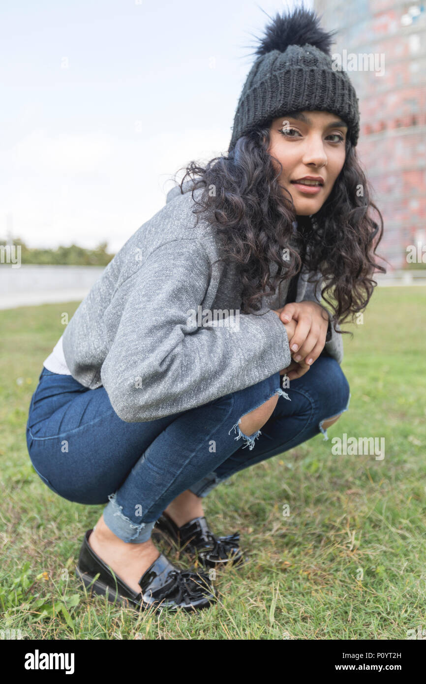 One young woman beach thinking wool hi-res stock photography and images ...