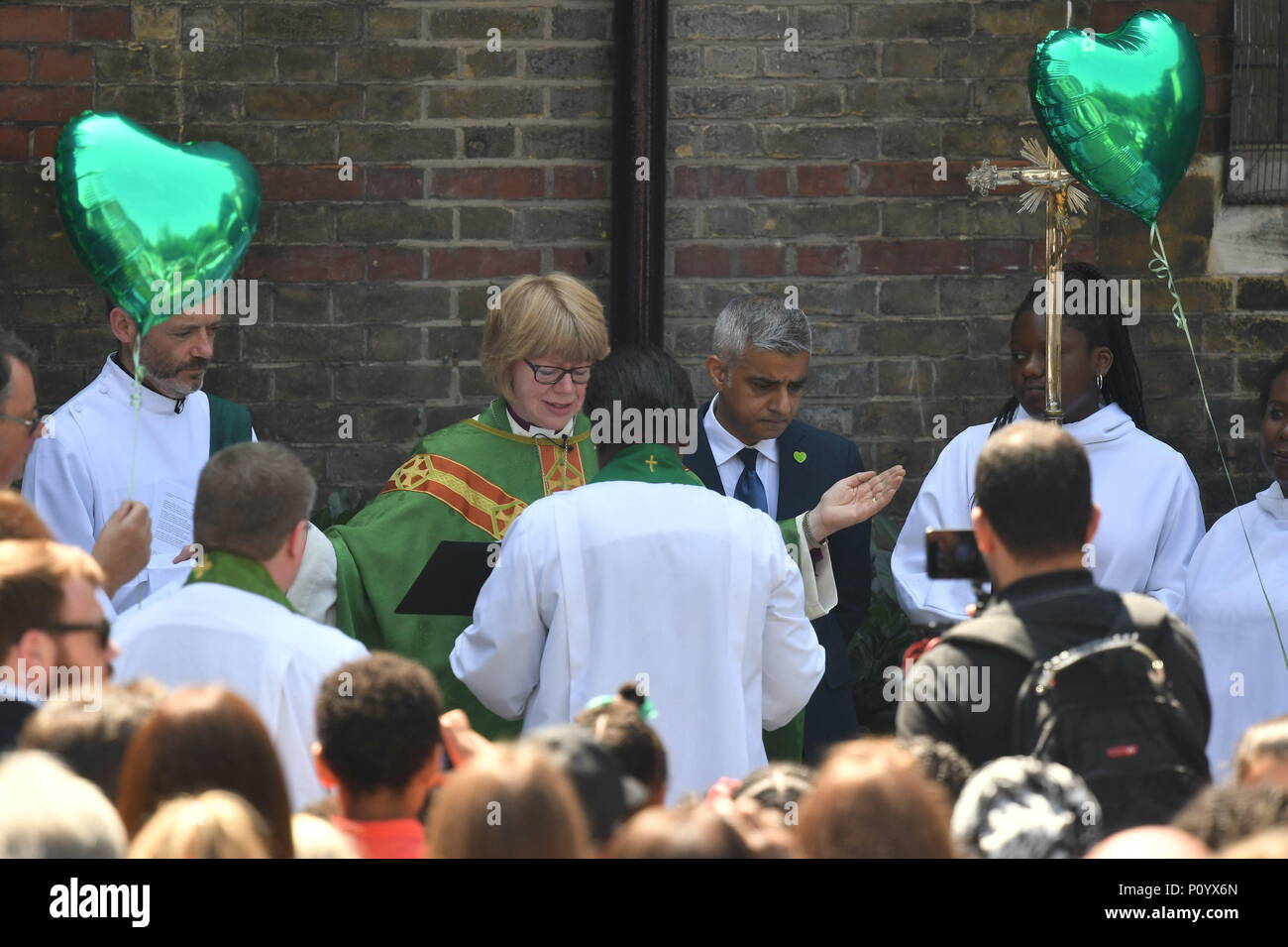 Mayor of London Sadiq Khan and Bishop of London Sarah Mullally attend the dedication of a new memorial garden at St Clement's Church, Notting Dale, west London to mark the first anniversary of Grenfell disaster. Stock Photo