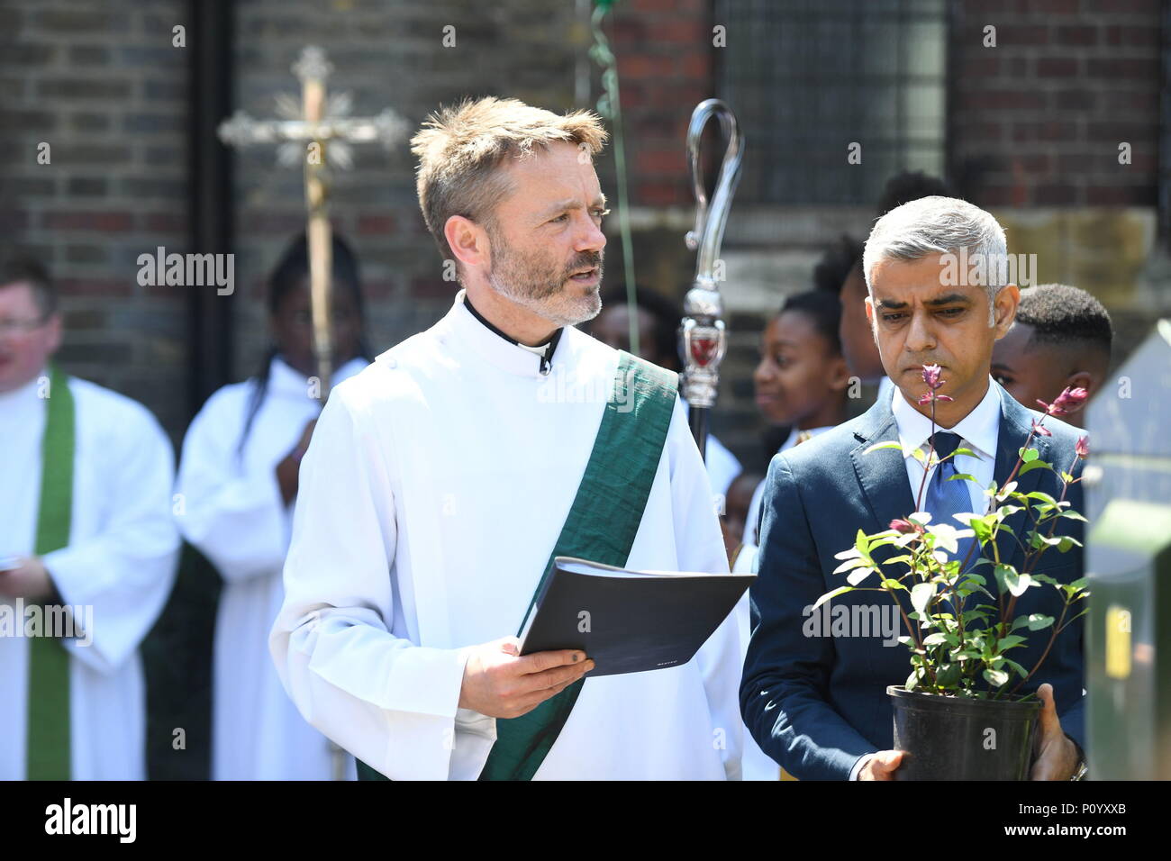Mayor of London Sadiq Khan attends the dedication of a new memorial garden at St Clement's Church, Notting Dale, west London to mark the first anniversary of Grenfell disaster. Stock Photo