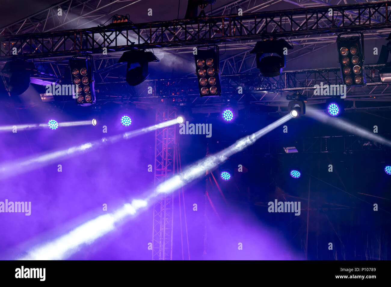 stage rig with lightning equipment. blue stage lights during the