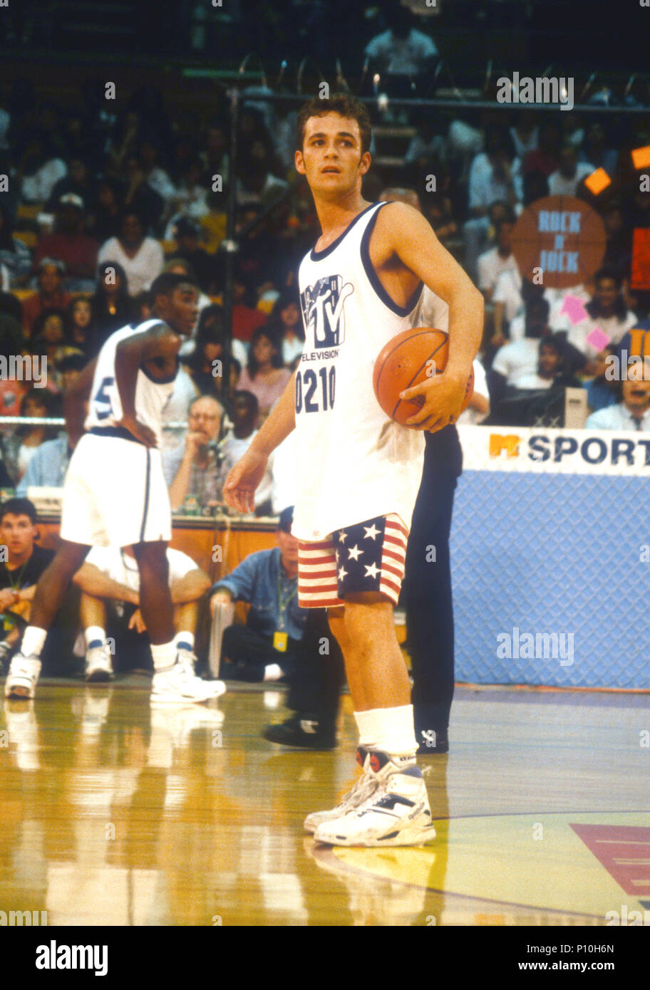 LOS ANGELES, CA - SEPTEMBER 15: Actor Luke Perry attends MTV's First Annual Rock 'N Jock Basketball Game on September 15, 1991 at Loyola Marymount University in Los Angeles, California. Photo by Barry King/Alamy Stock Photo Stock Photo