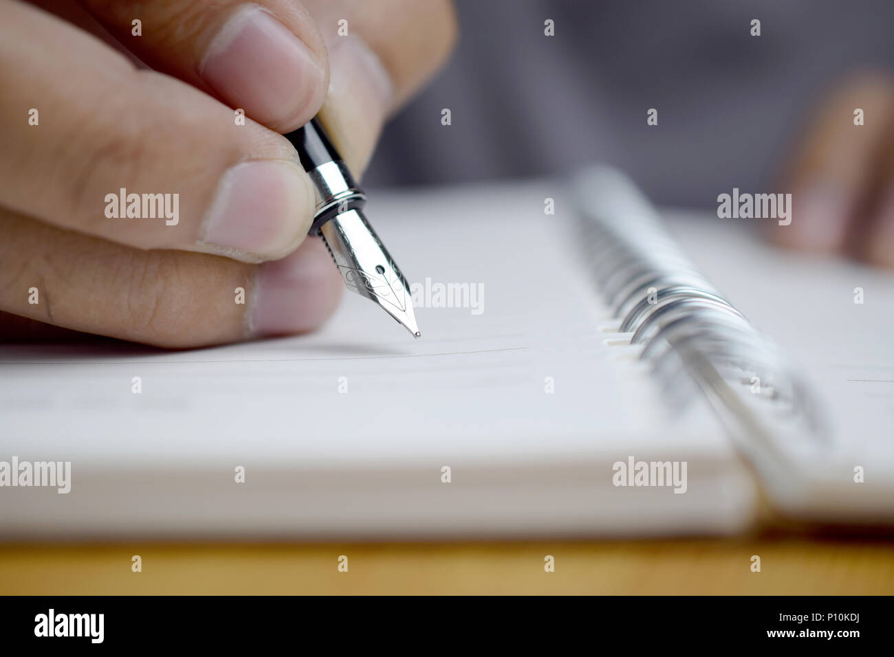 Man hand writing studying hi-res stock photography and images - Alamy