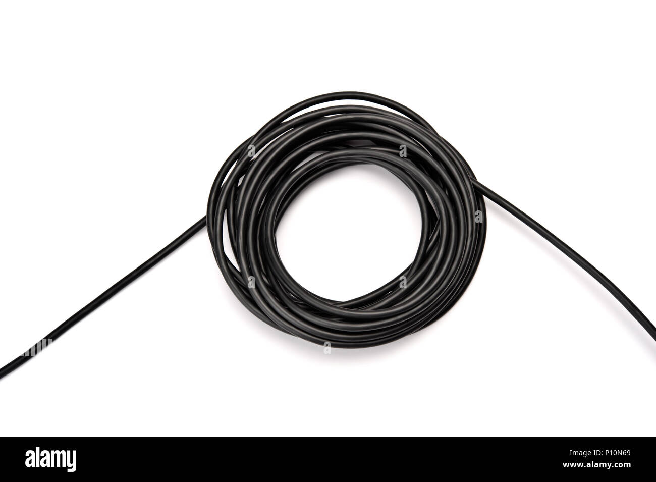 Black electric cable on white background. Stock Photo