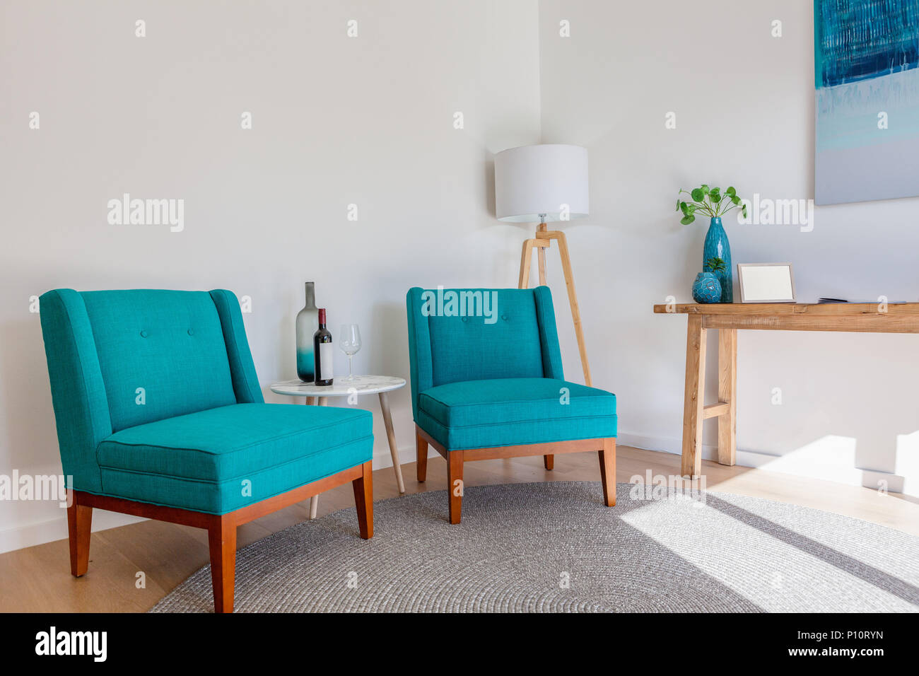 Scandinavian furniture interior with copy space armchairs small tables and lamp under natural sunlight