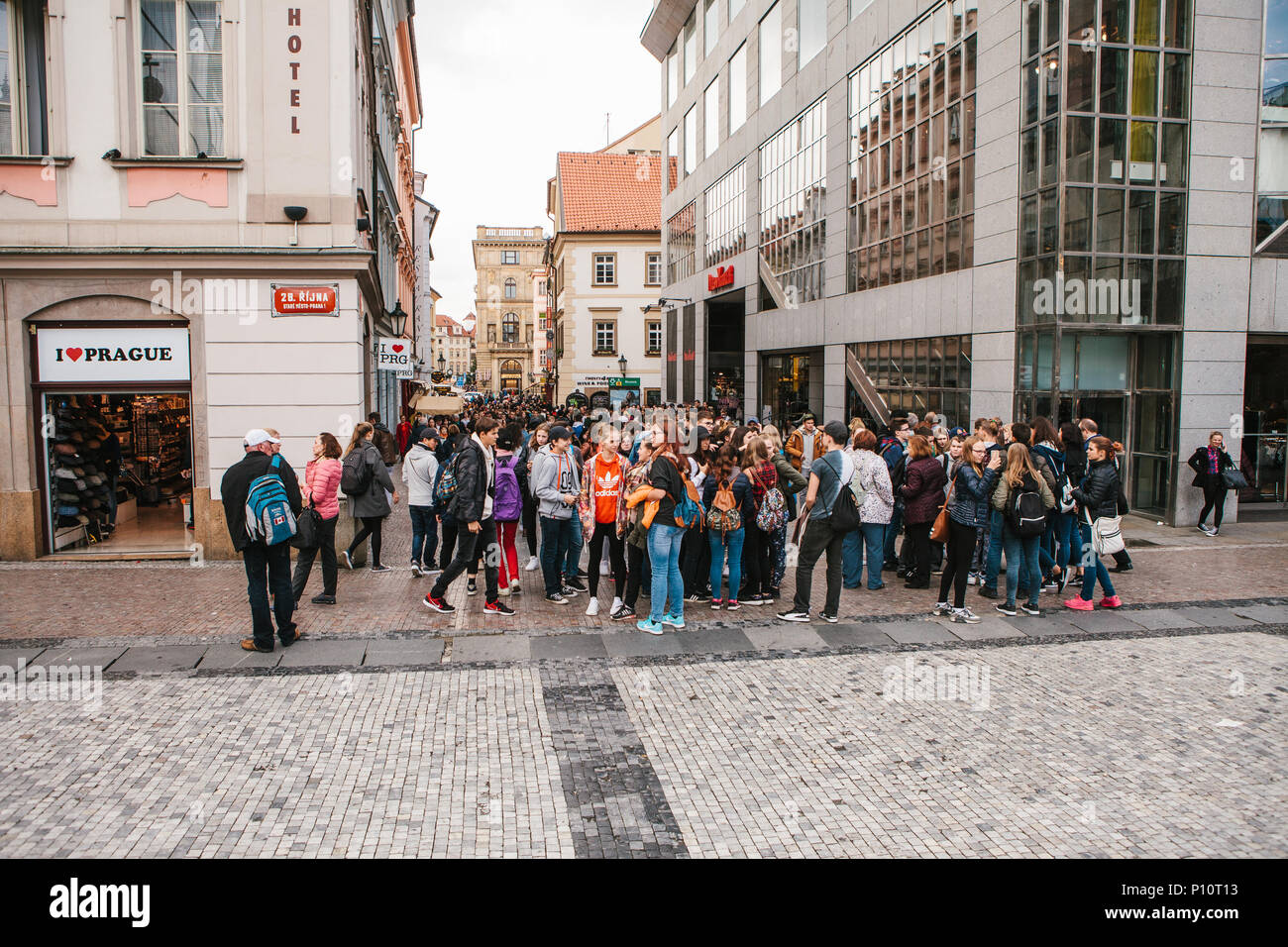 Prague, September 25, 2017: Many school children on the city street communicate after school and are going somewhere. Or young tourists or students are looking at the architecture of the city Stock Photo