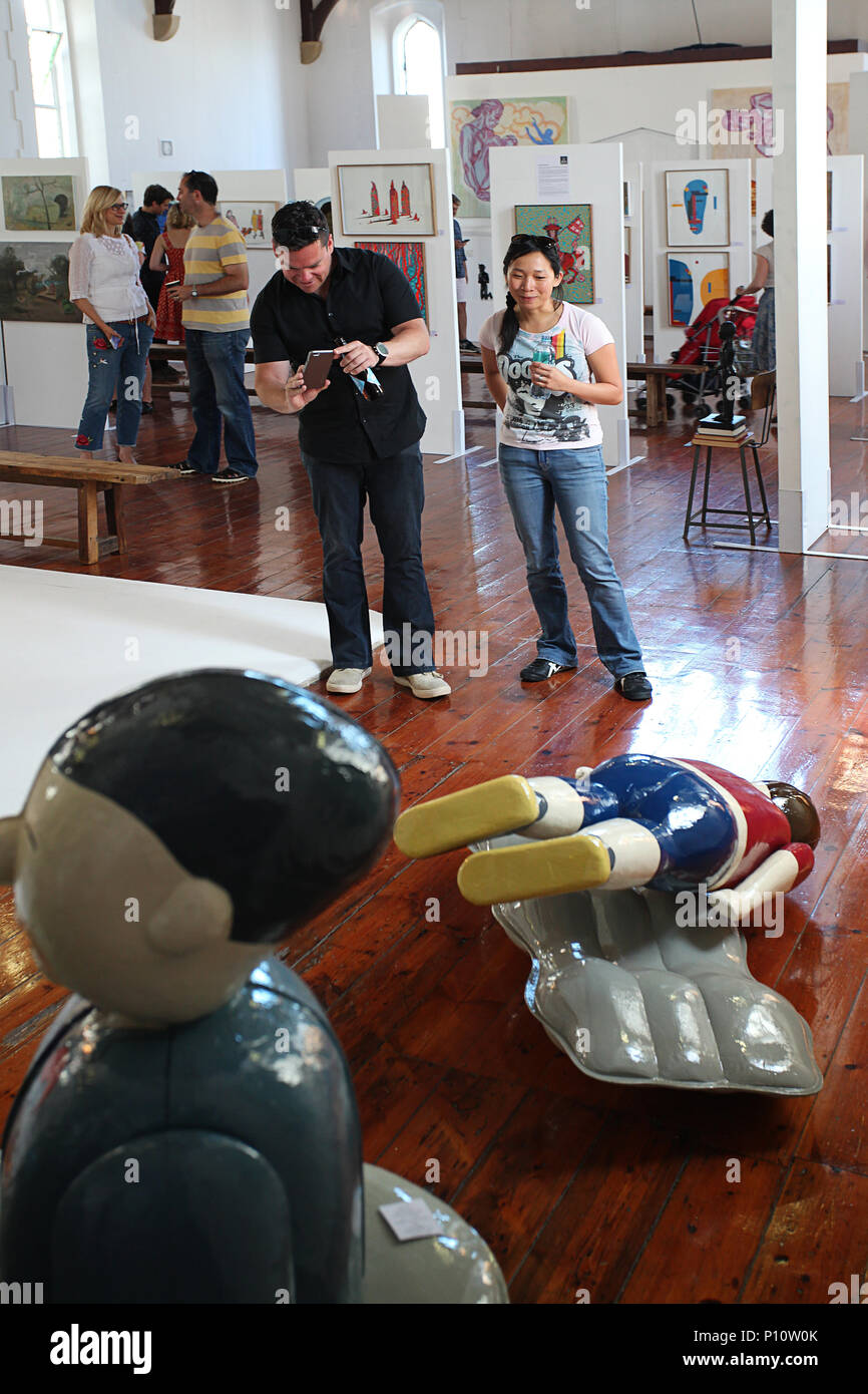 People enjoying art at a Contemporary Art Expo Stock Photo - Alamy