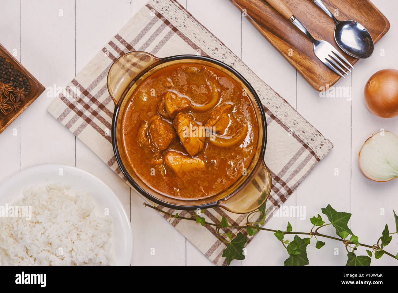 Spicy chicken and potato curry Stock Photo - Alamy
