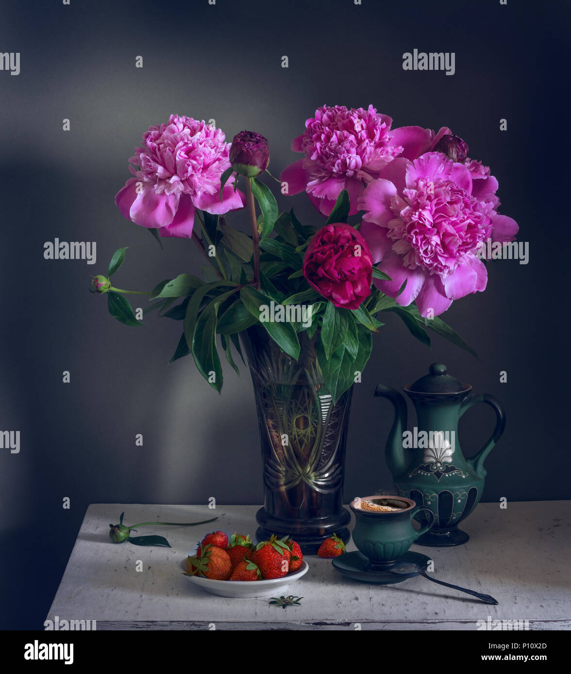 still life with flowers, strawberries and a cup of coffee. a bouquet of ...