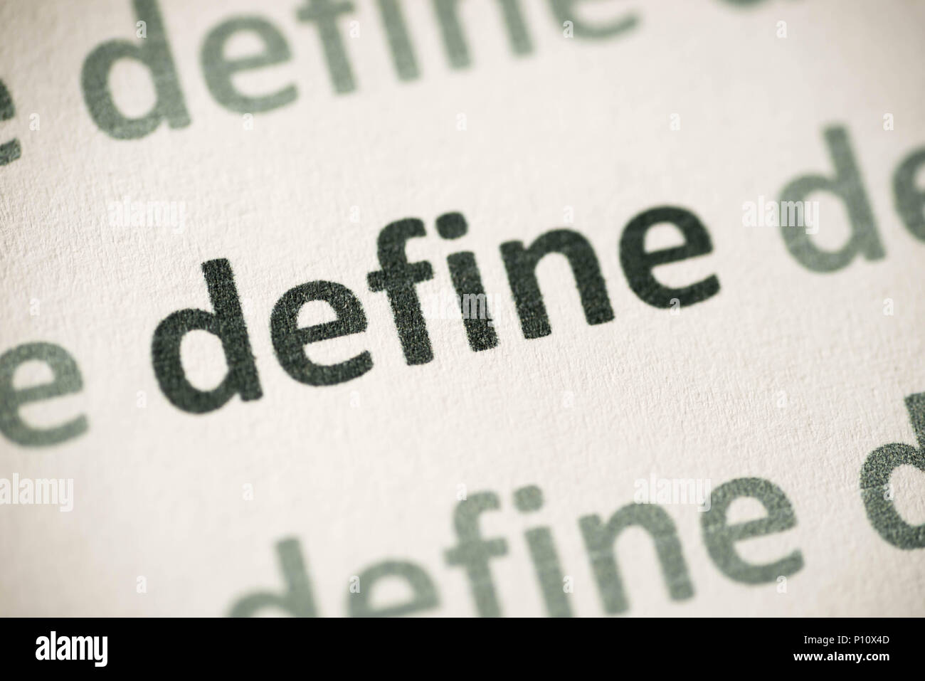 word define printed on white paper macro Stock Photo Alamy