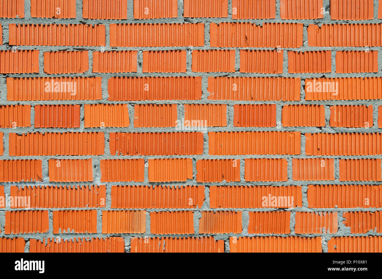 Brick wall built of special brick intended for further plastering Stock Photo