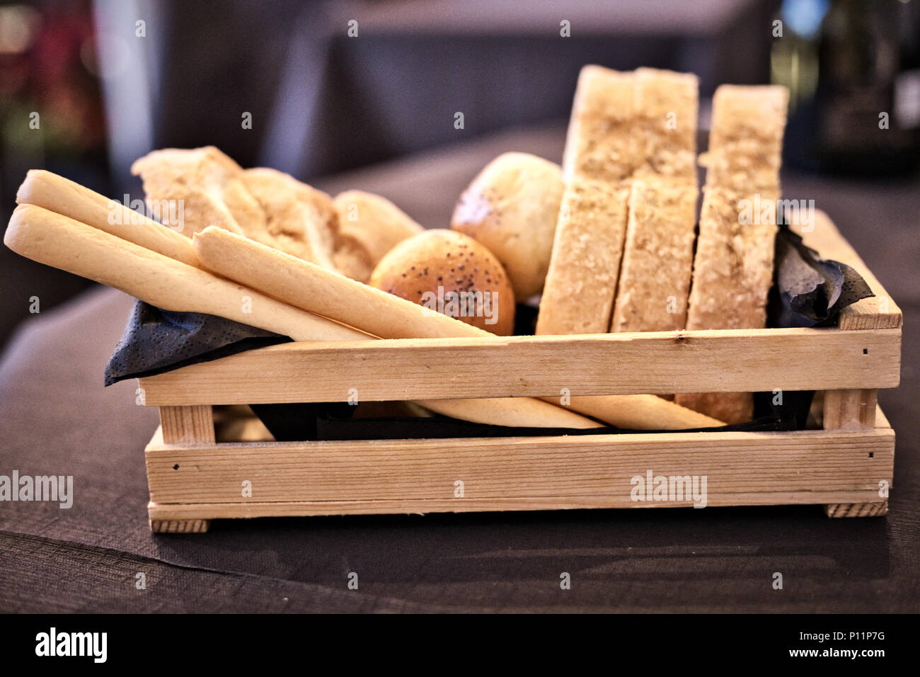 Bread Basket on Restaurant table Stock Photo - Alamy