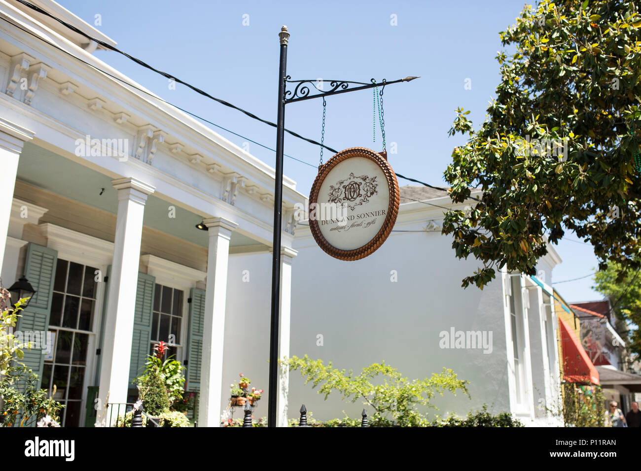 Sign outside Dunn & Sonnier florist and antique shop on Magazine Street in the Garden District of New Orleans, Louisiana, USA. Stock Photo