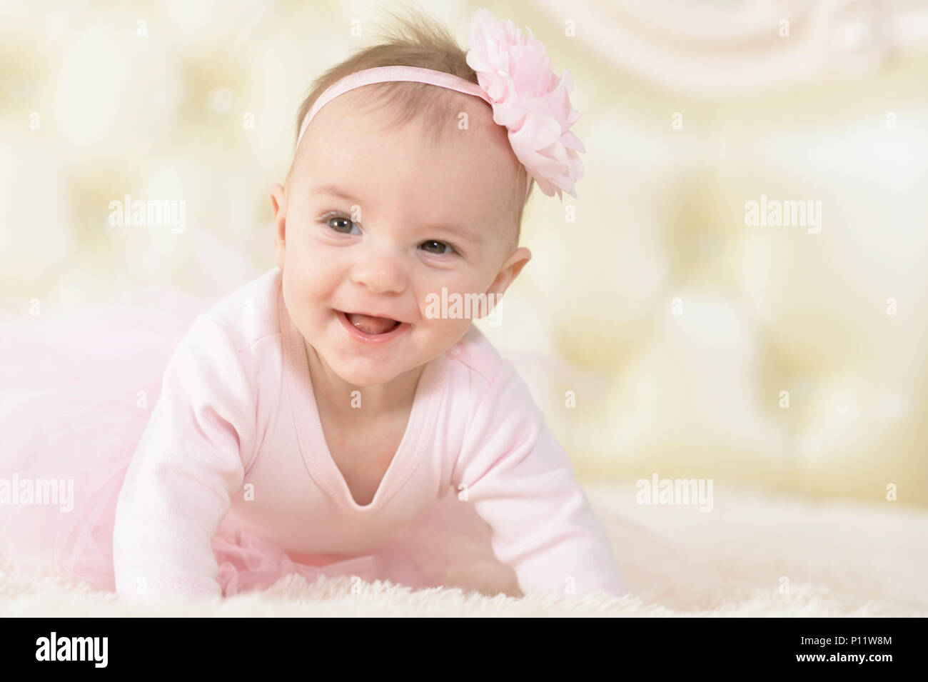 Cute charming girl in pink dress Stock Photo - Alamy