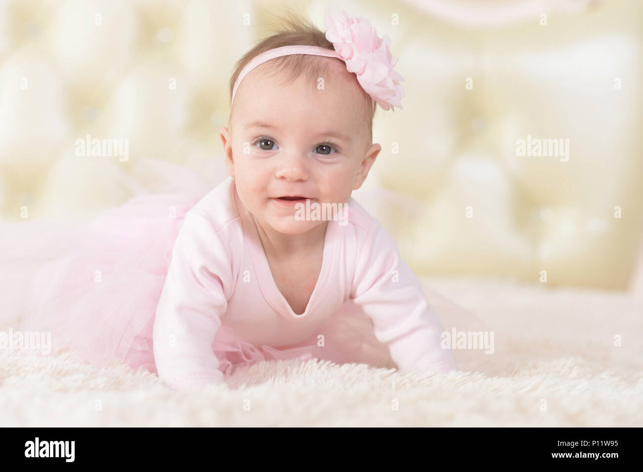 Cute charming girl in pink dress Stock Photo - Alamy