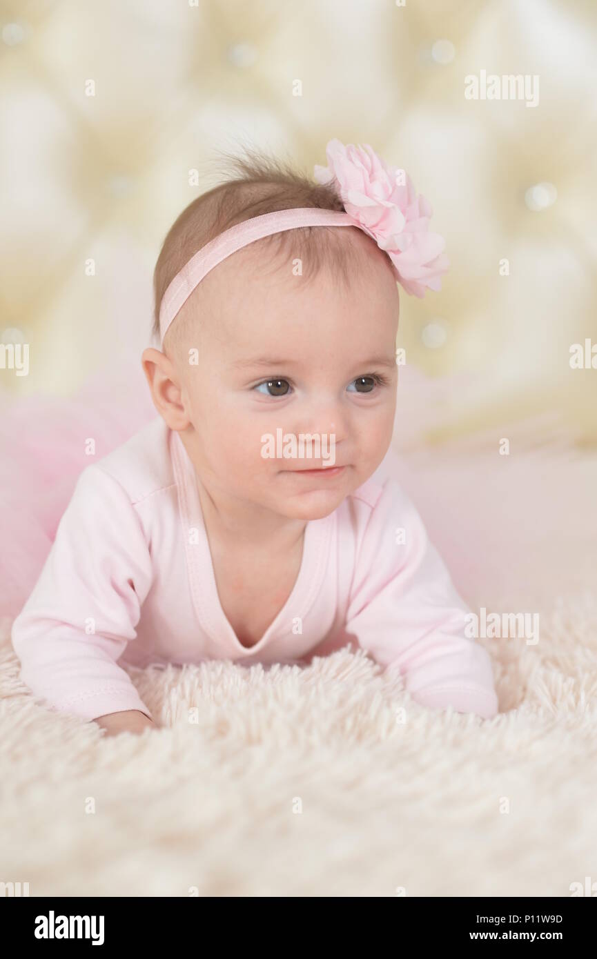 Cute charming girl in pink dress Stock Photo - Alamy