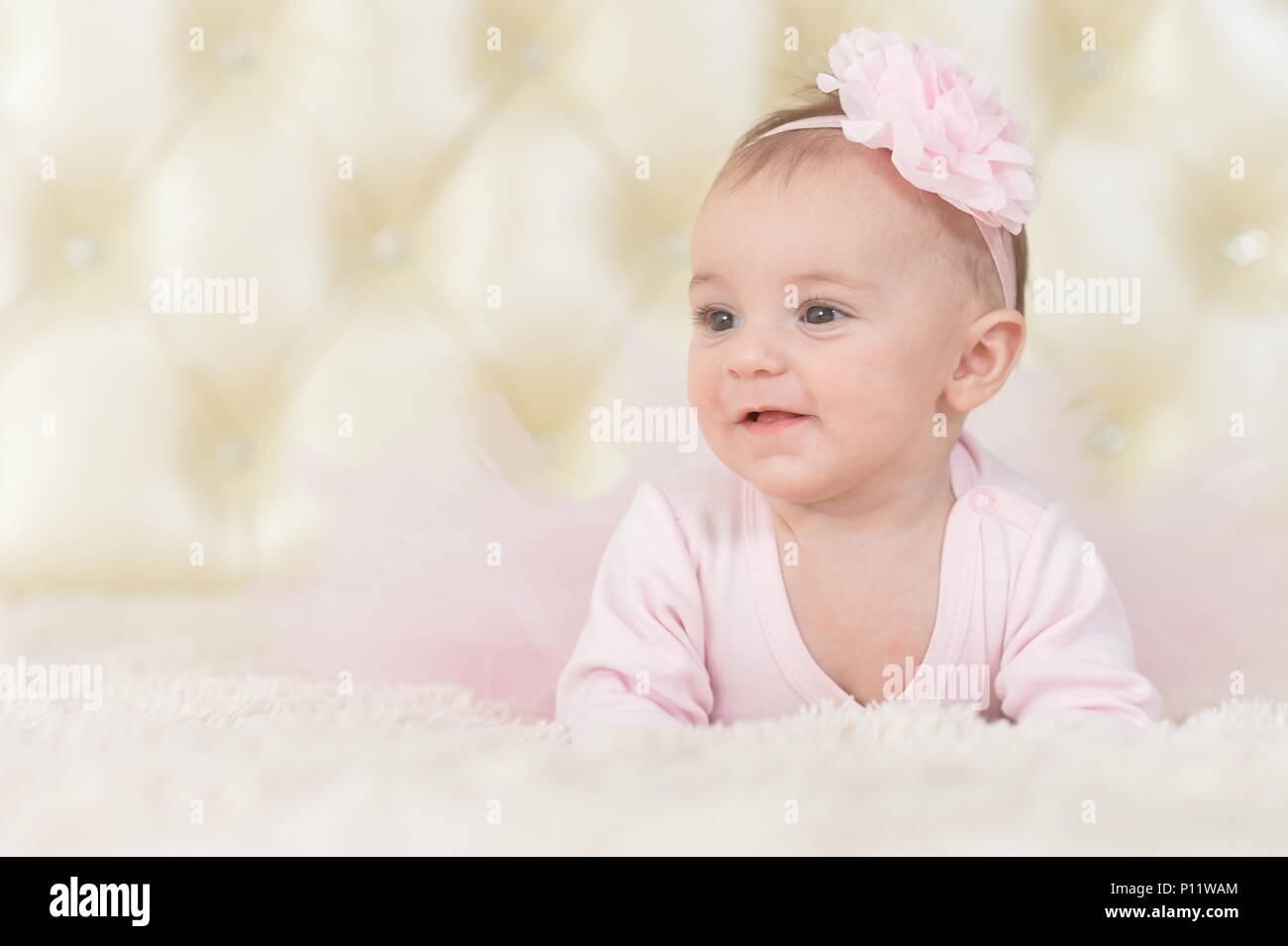 Cute charming girl in pink dress Stock Photo - Alamy