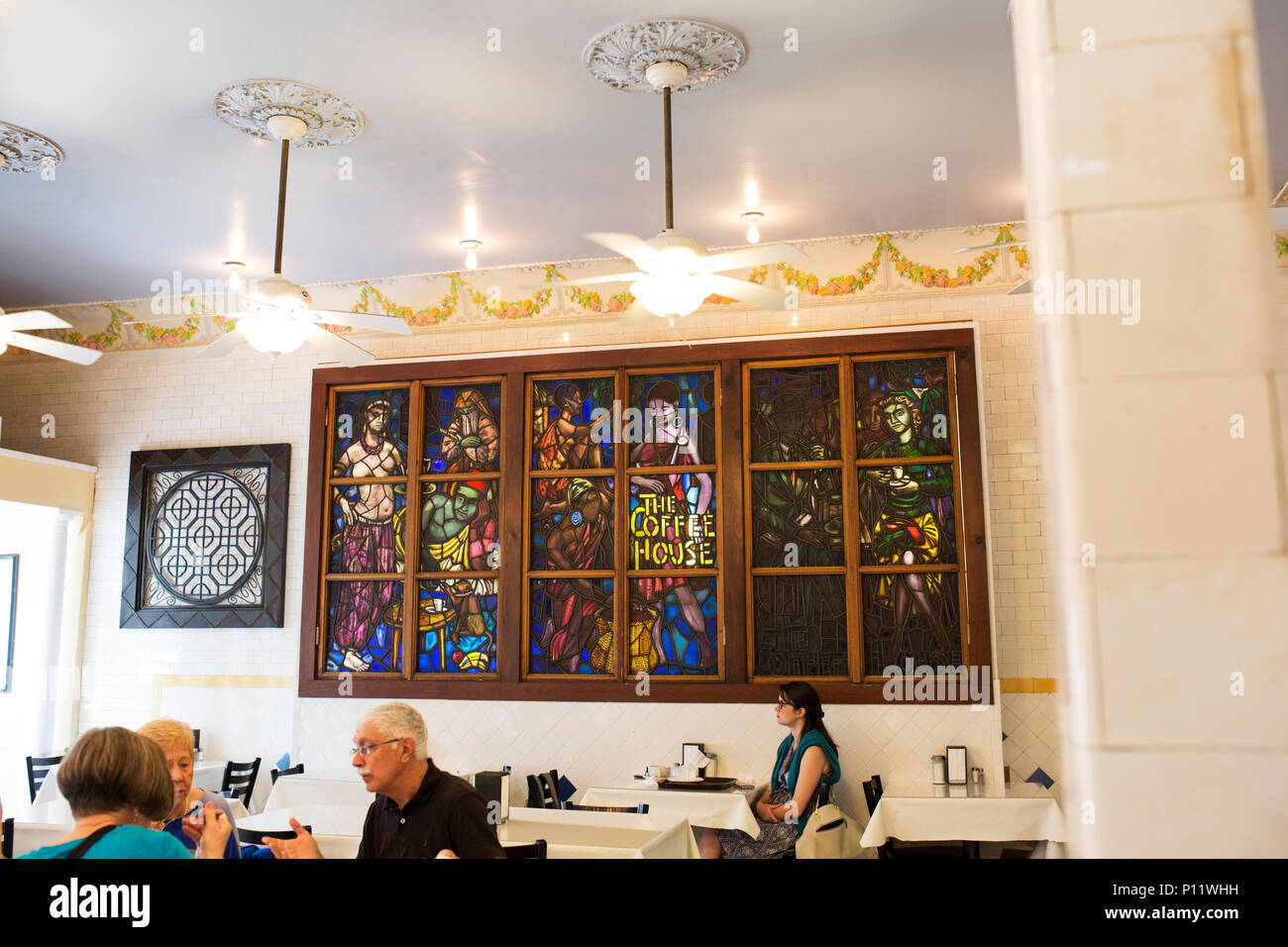 A stained glass window inside the Croissant d'or patisserie on