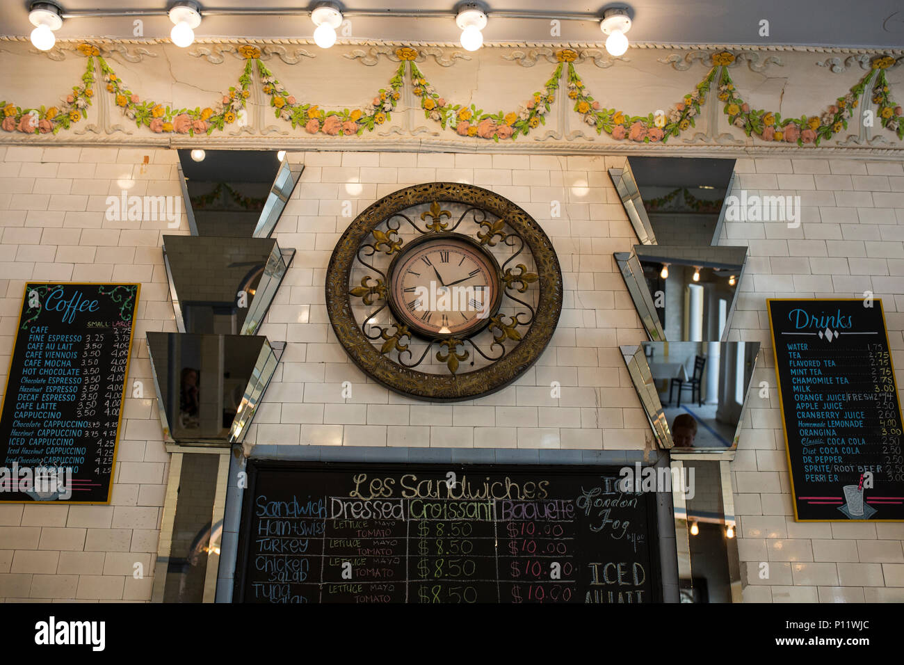 Art deco mirrors and an antique clock inside the Croissant d'or ...