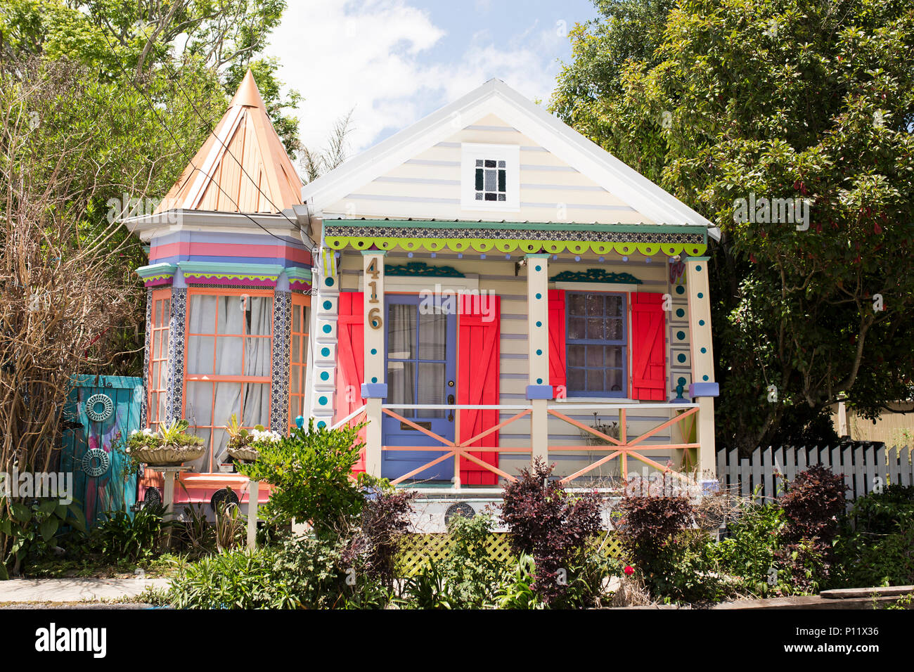 A colorful Victorian style shotgun house in the West Riverside neighborhood in New Orleans, Louisiana. Stock Photo