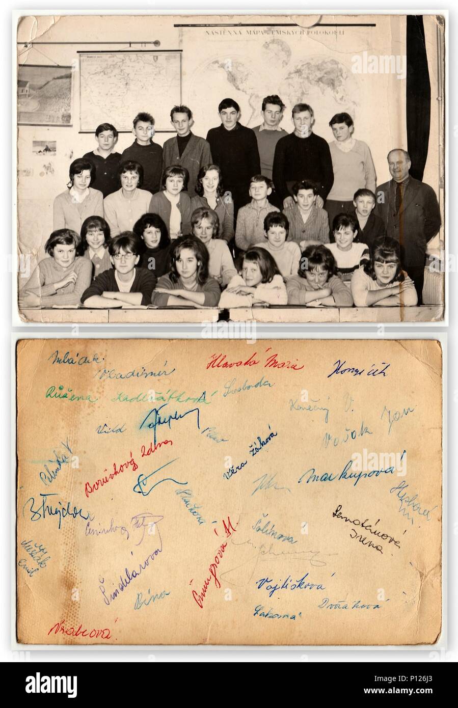 THE CZECHOSLOVAK SOCIALIST REPUBLIC - CIRCA 1960s: Retro photo shows students with male teacher in the classroom. The back of vintage photo shows signatures. Stock Photo