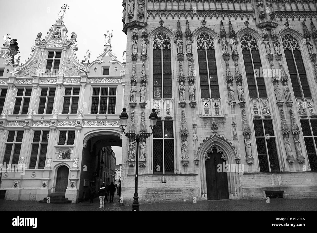 Civic Registry (Burgerlijke Griffie) and Town Hall (Stadhuis) from Burg Square, showing entrance to Blinde-Ezelstraat, Brugge, Belgium: b.w version Stock Photo
