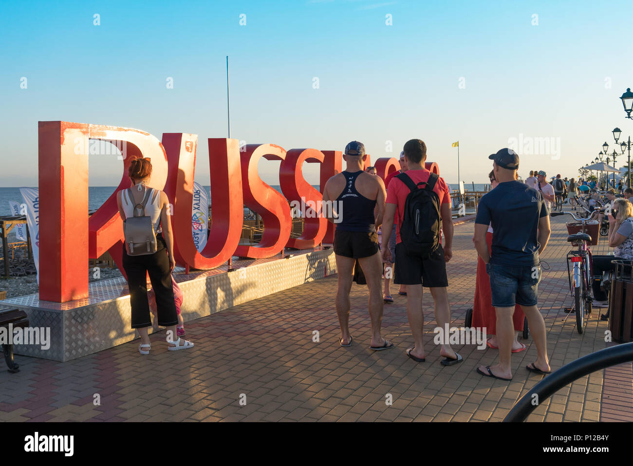 Sochi, Russia-June 9, 2018: People are photographed at the big red inscription. Stock Photo
