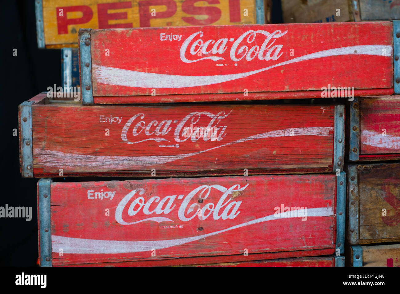 Berlin, Germany - june 09, 2018: The Coca Cola and Pepsi brand logo on old vintage  boxe  / case for bottlesboxes / case for bottles Stock Photo