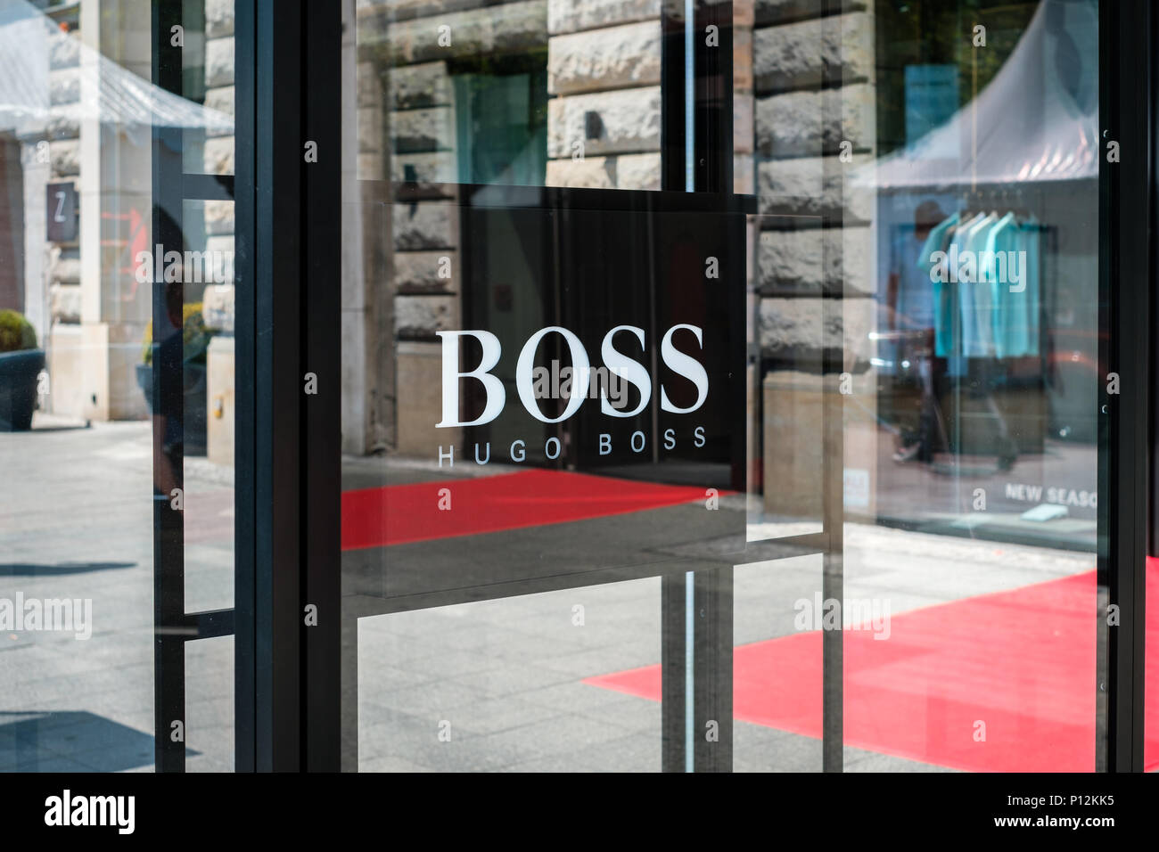 Berlin, Germany - june 09, 2018: The logo / brand name of HUGO BOSS on shop  facade exterior in Berlin, Germany Stock Photo - Alamy