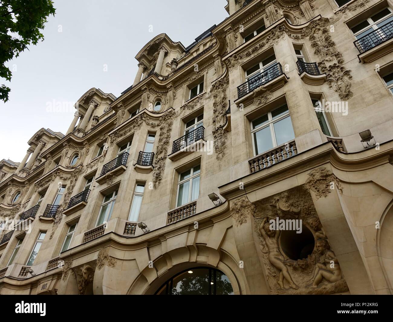 Art nouveau building designed by Chédanne George’s, with sculptures by Hippolyte Lefebvre, on thé Champs Élysée, Paris, France. Stock Photo