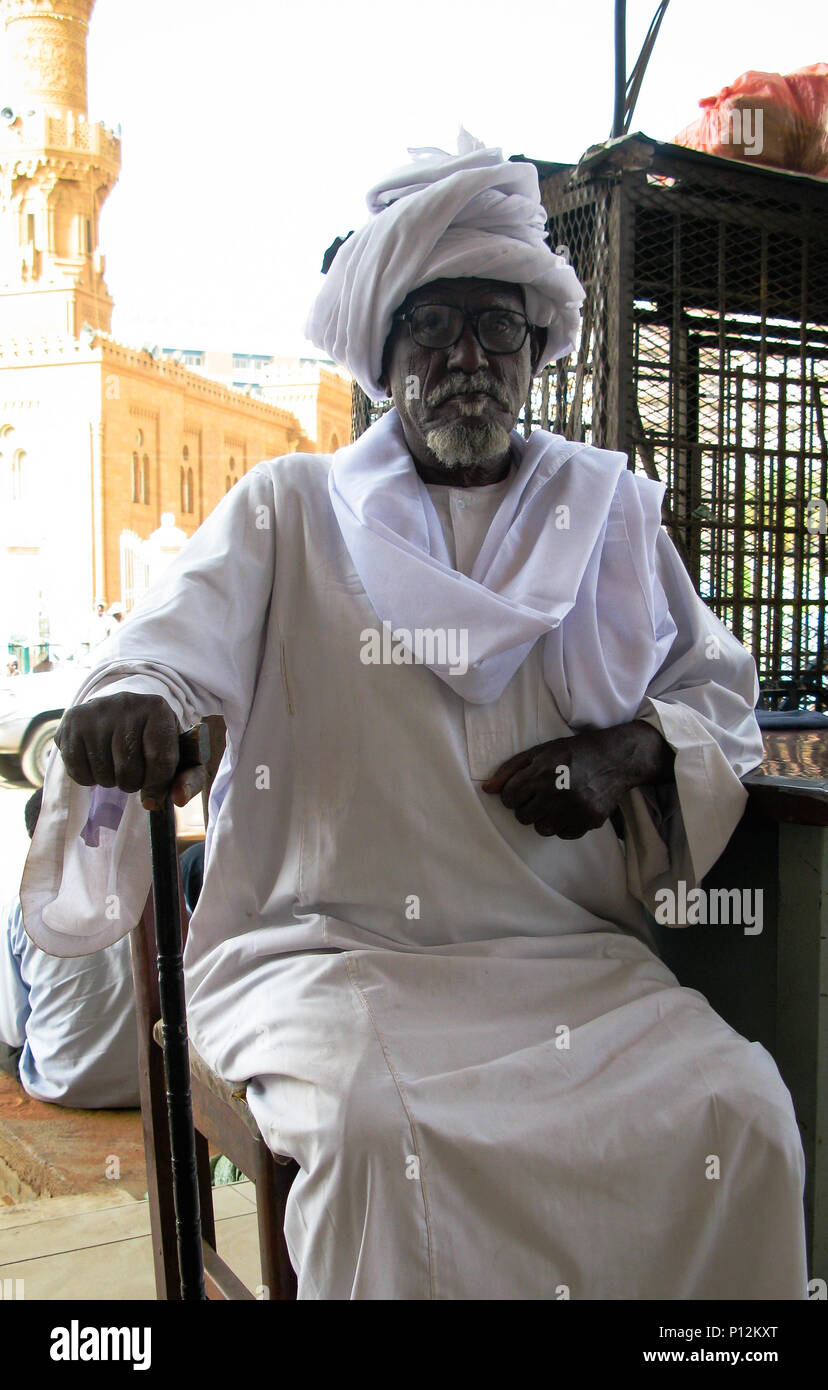 Portrait of the old man with national clothes jellabiya at the Khartoum street - 07 february 2011 Khartoum Sudan Stock Photo
