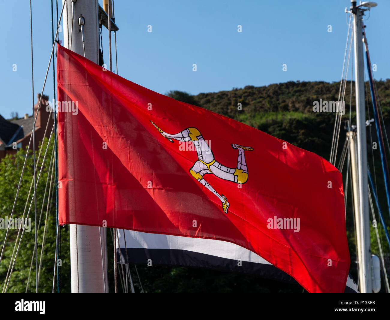 Isle Of Man Manx Flag Legs Of Man On Red Background Stock Photo Alamy Isle Of Man Manx Flag Legs Of Man On Red Background Stock Photo Alamy