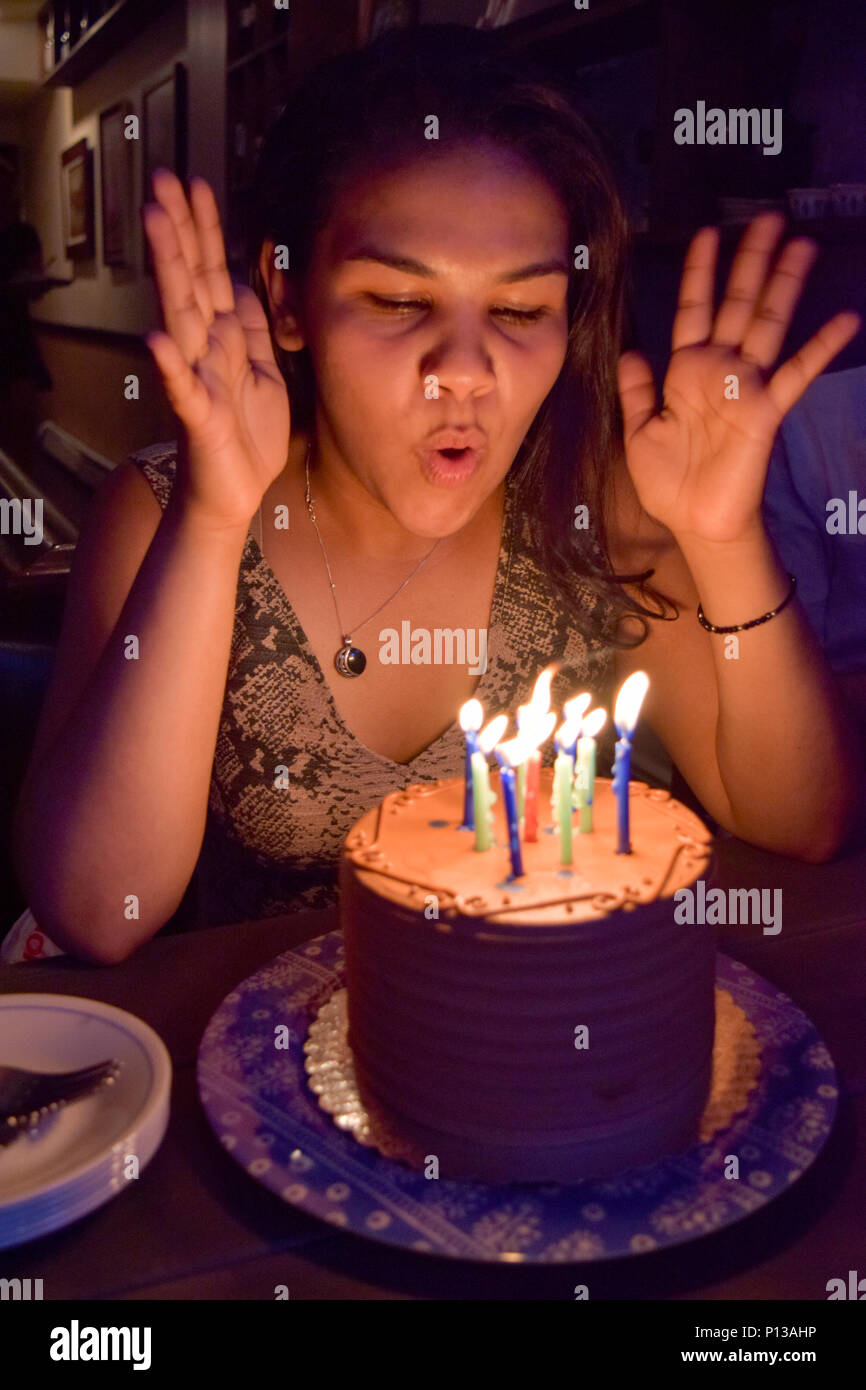 Woman blow birthday candles hires stock photography and images Alamy