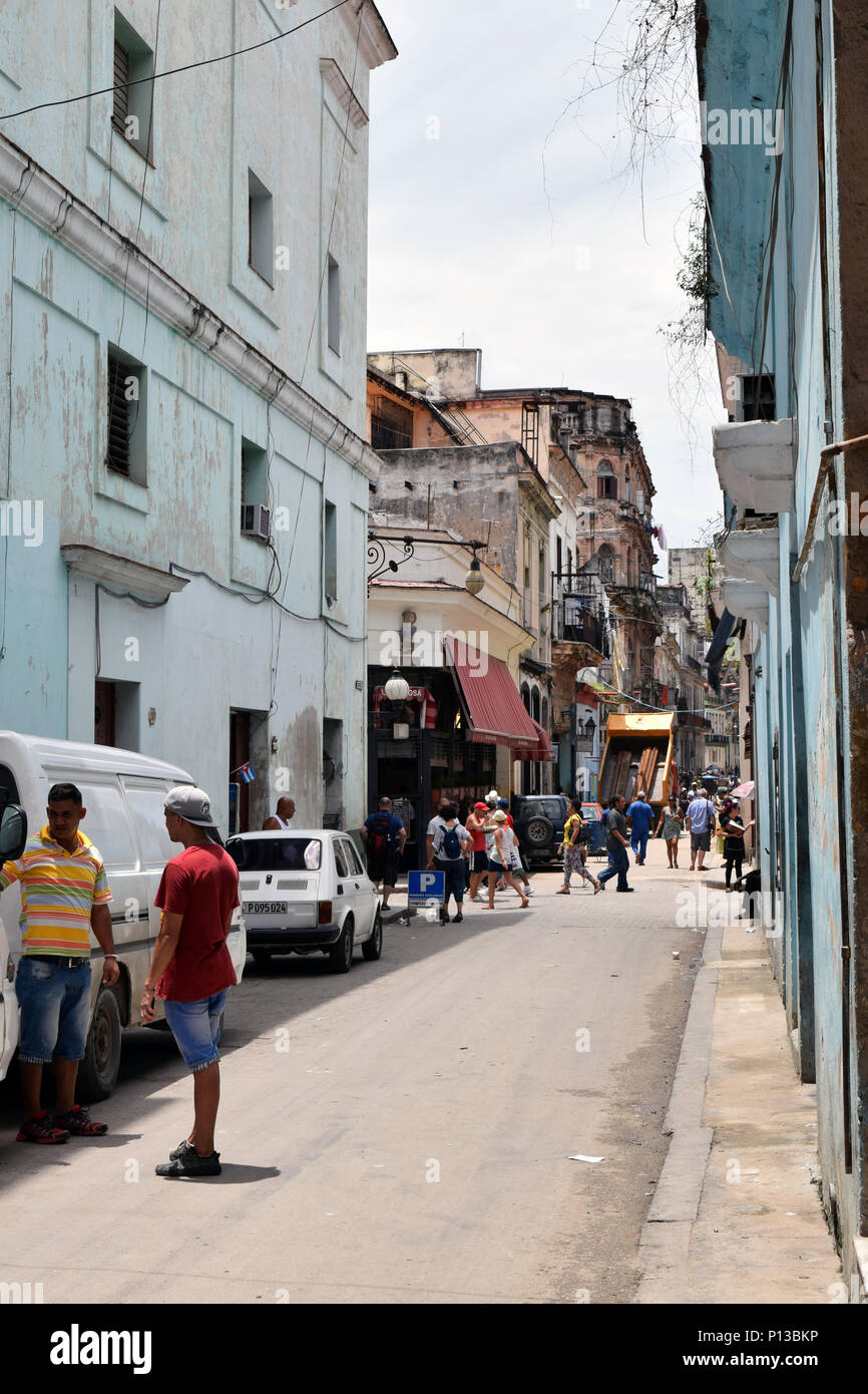 HAVANA, CUBA - JUNE 10th, 2016: A street in downtown La Habana with people going about their day Stock Photo