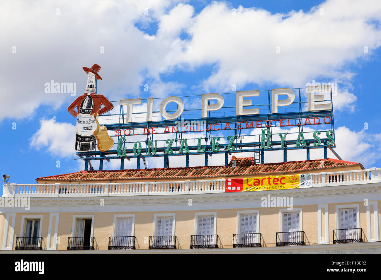 Famous landmark neon sign “Tio Pepe” sherry, plaza de Puerta del Sol, Madrid, Spain. May 2018 Stock Photo