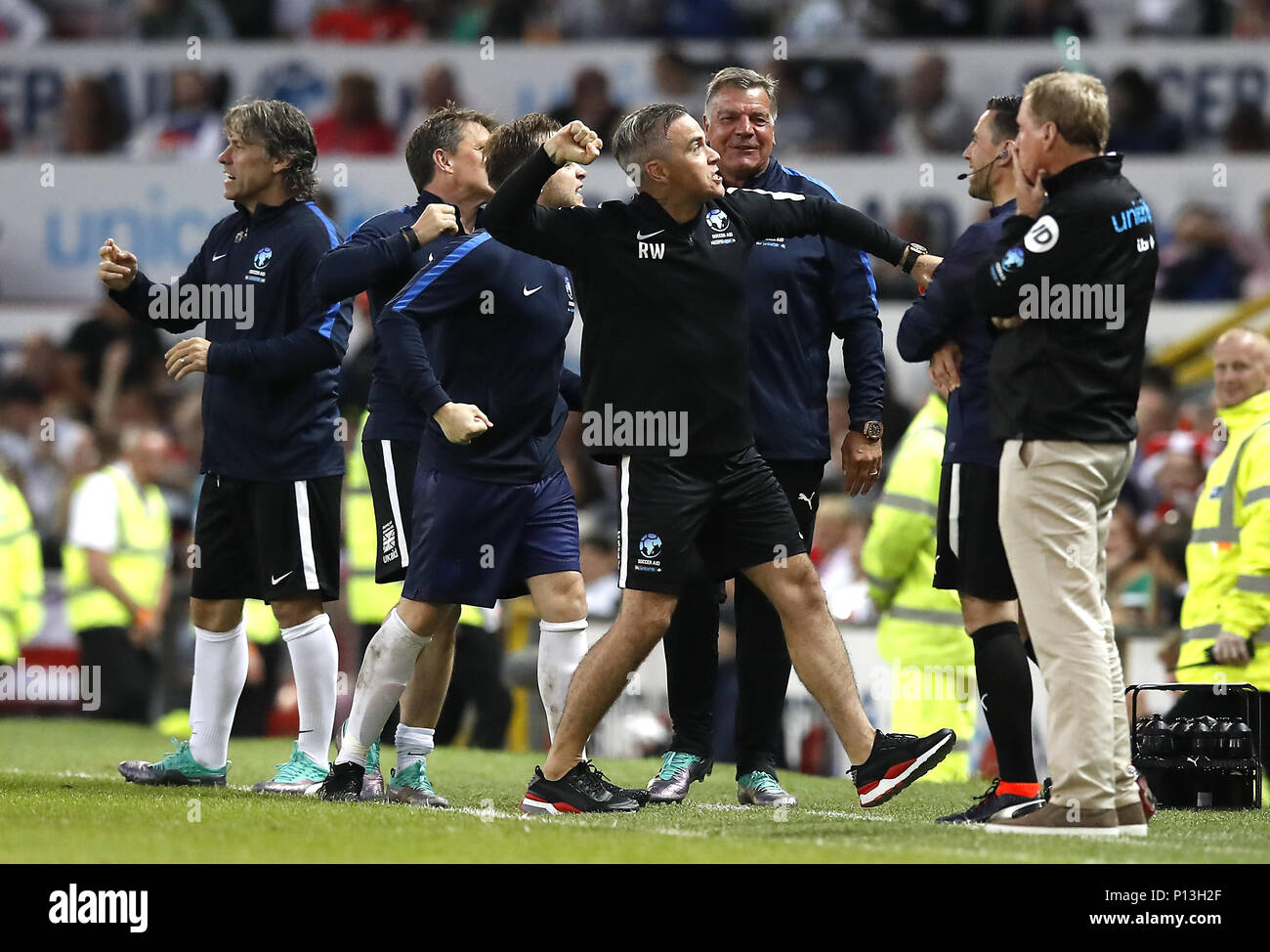 England S John Bishop Ben Shepard Olly Murs Sam Allardyce And Robbie Williams Celebrate Their Third Goal Of The Game During The Unicef Soccer Aid Match At Old Trafford Manchester Stock Photo