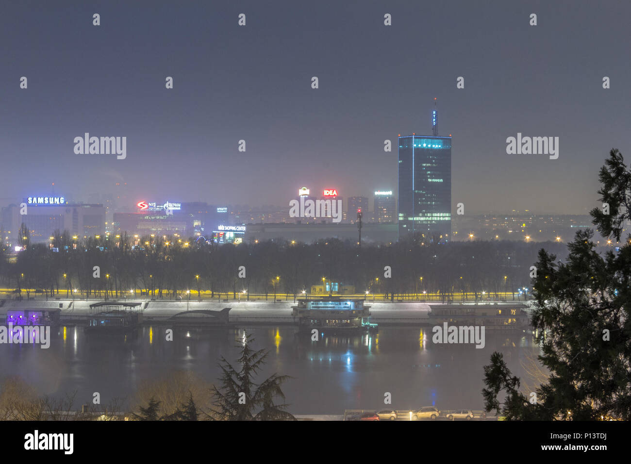 BELGRADE, SERBIA - JANUARY 2, 2015: Skyline of New Belgrade (Novi Beograd) seen by night from the Kalemegdan fortress. The main landmarks of the distr Stock Photo