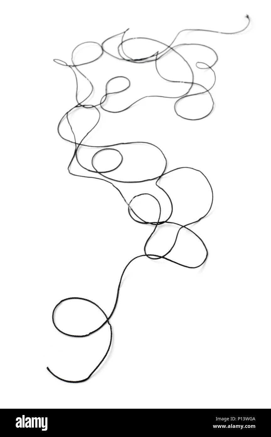 Tangled black thread isolated on white background Stock Photo - Alamy