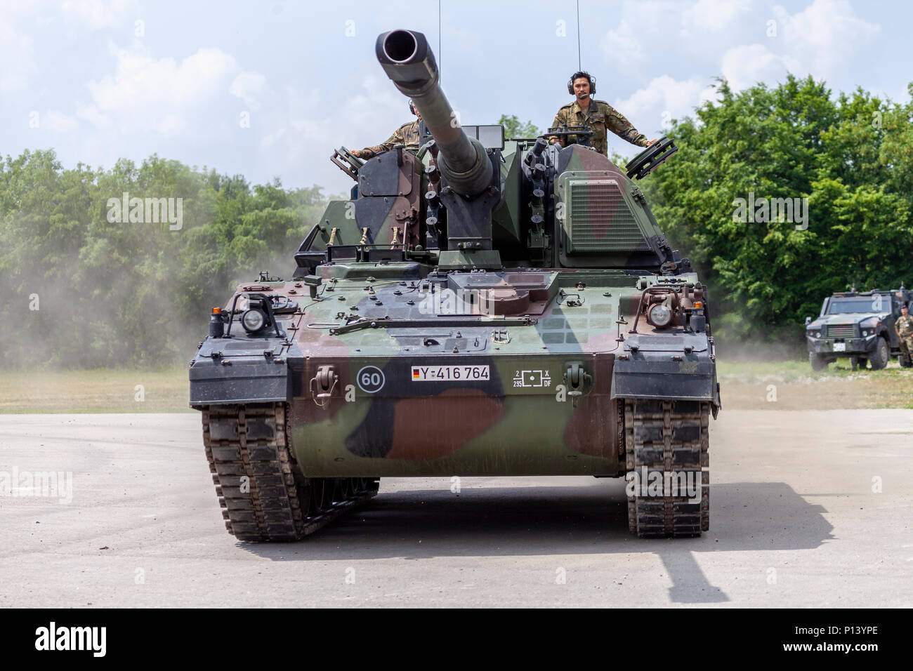 FELDKIRCHEN / GERMANY - JUNE 9, 2018: German Panzerhaubitze 2000, artillery tank drives on a road on Day of the Bundeswehr in Feldkirchen / Germany. Stock Photo