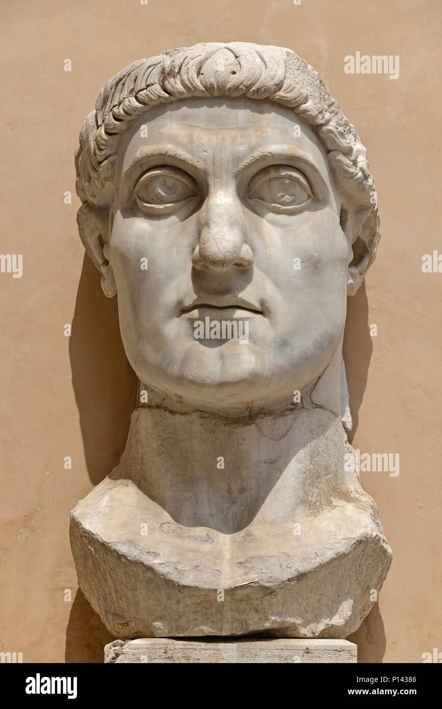 Remains of the Ancient Roman Colossus of Constantine, head and face, frontal view, courtyard of the Palazzo dei Conservatori, Capitonine, Rome, Italy Stock Photo