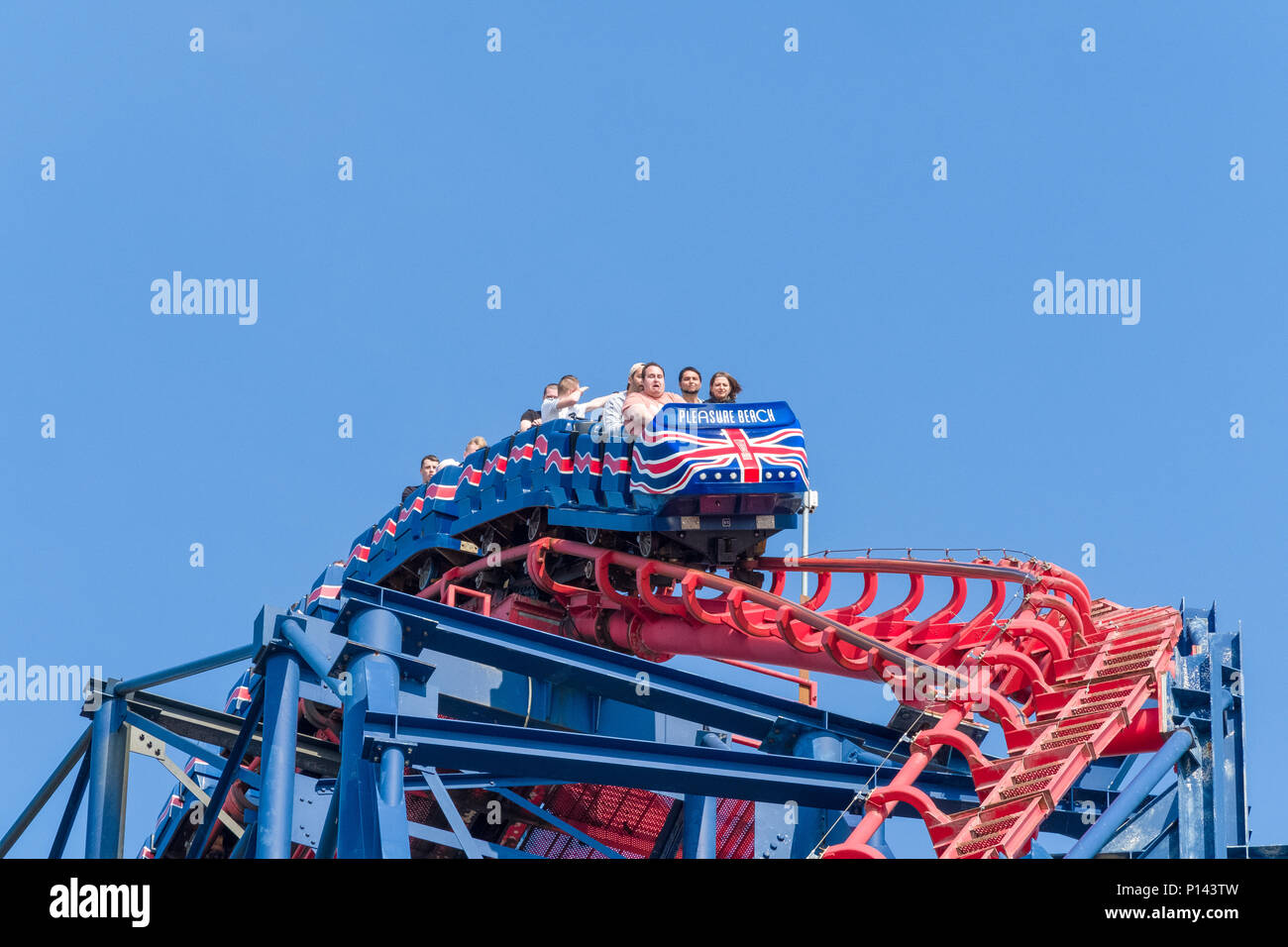 People at the top of The Big One roller coaster, Blackpool Pleasure Beach, Lancashire, England, UK Stock Photo