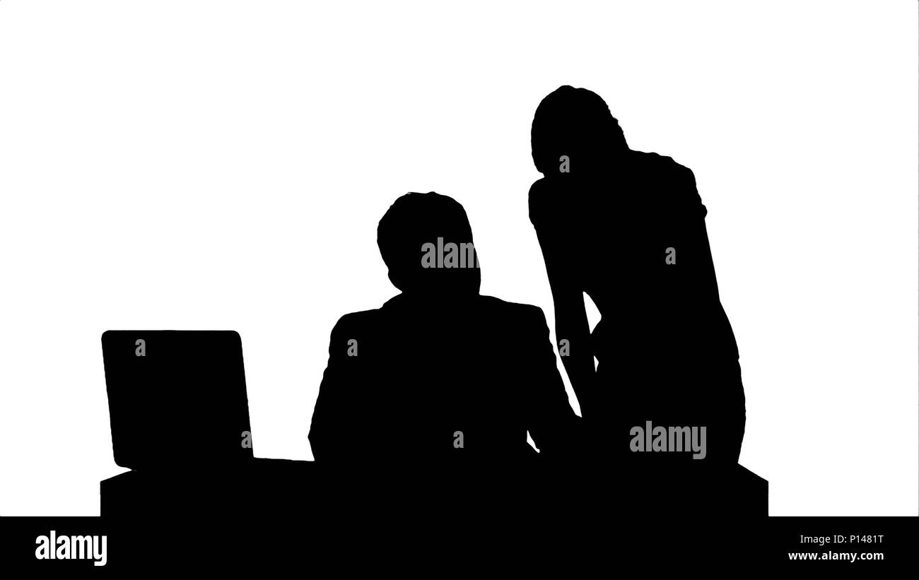 Silhouette Businesswoman standing in the office presenting a document to her boss sand signature. Stock Photo