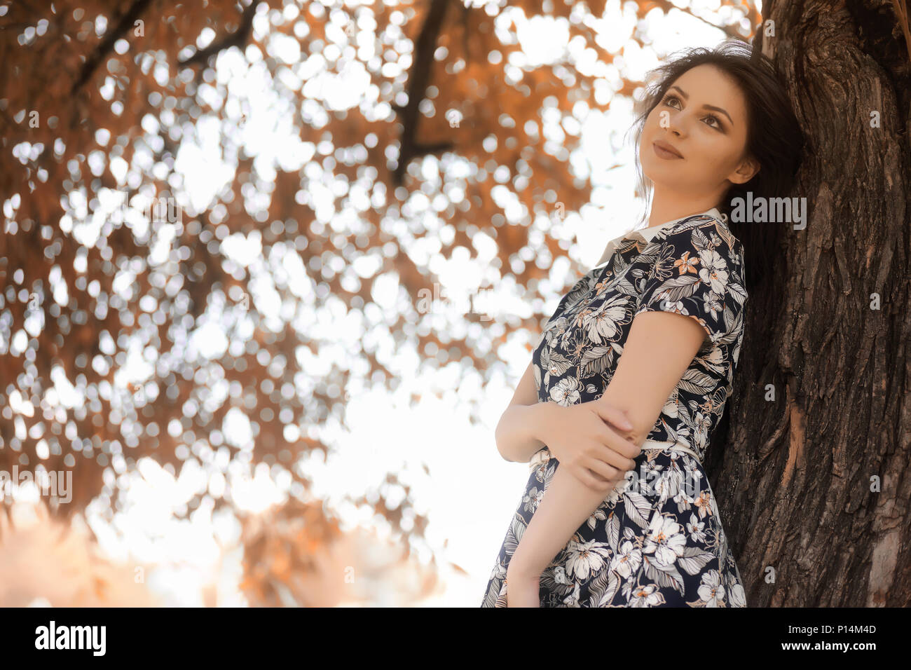 Beautiful girl for a walk in autumn on the nature Stock Photo - Alamy