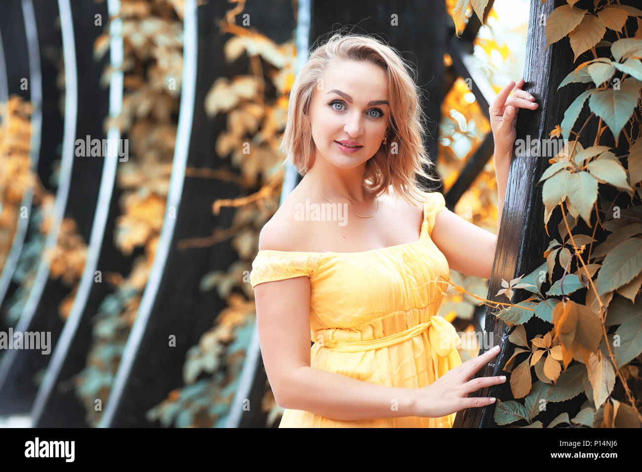 Beautiful girl in the park on a autumn sunny day walk Stock Photo - Alamy