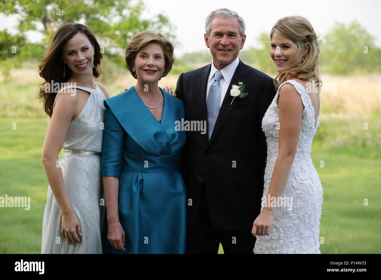President and Mrs. Bush pose with their daughters Barbara and Jenna. President George W. Bush and Mrs. Laura Bush pose with daughters Jenna and Barbara Saturday, May 10, 2008, at Prairie Chapel Ranch in Crawford, Texas, prior to the wedding of Jenna and Henry Hager. Stock Photo