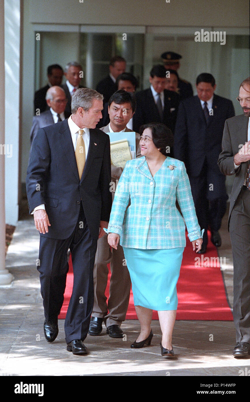 President George W. Bush  and President Megawati Sukarnoputri of Indonesia walk along the Colonnade Wednesday, Sept. 19, 2001, at the White House.  Photo by Paul Morse, Courtesy of the George W. Bush Presidential Library Stock Photo