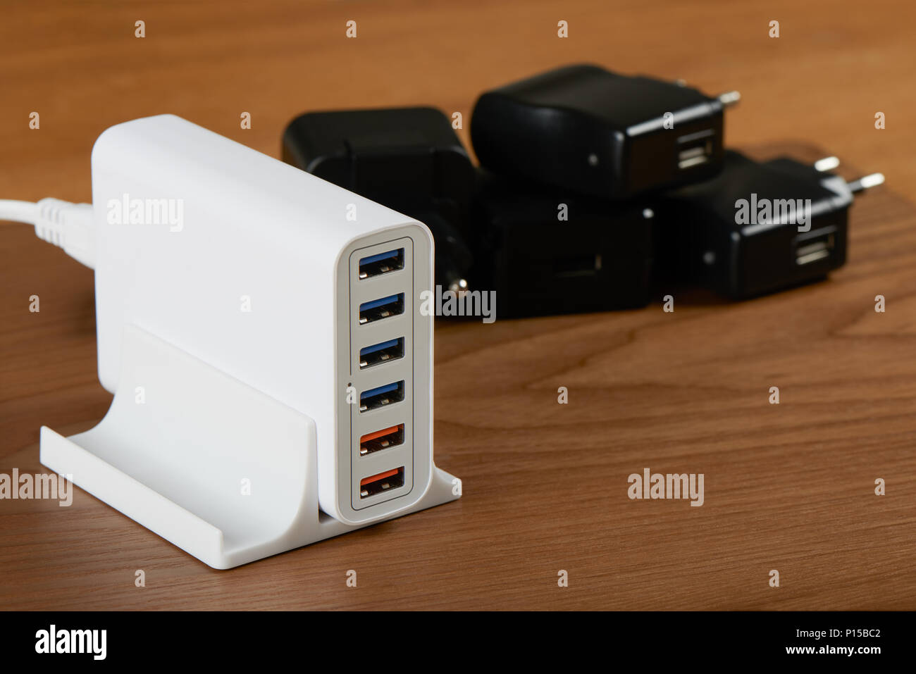 multiport charging station and a heap of general single port charger Stock Photo