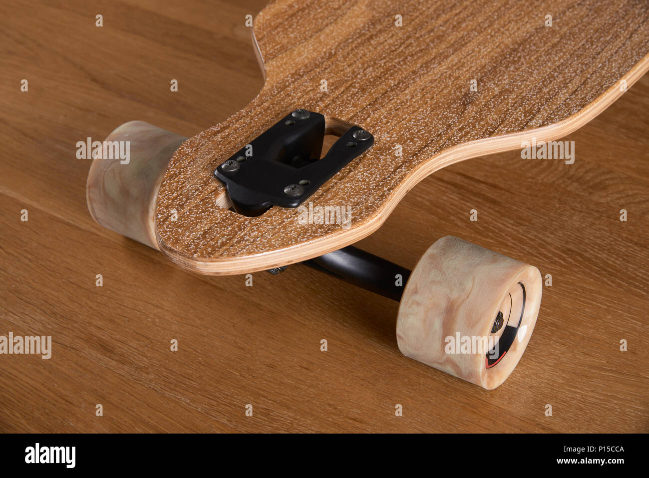 closeup of drop through type mount of longboard Stock Photo - Alamy