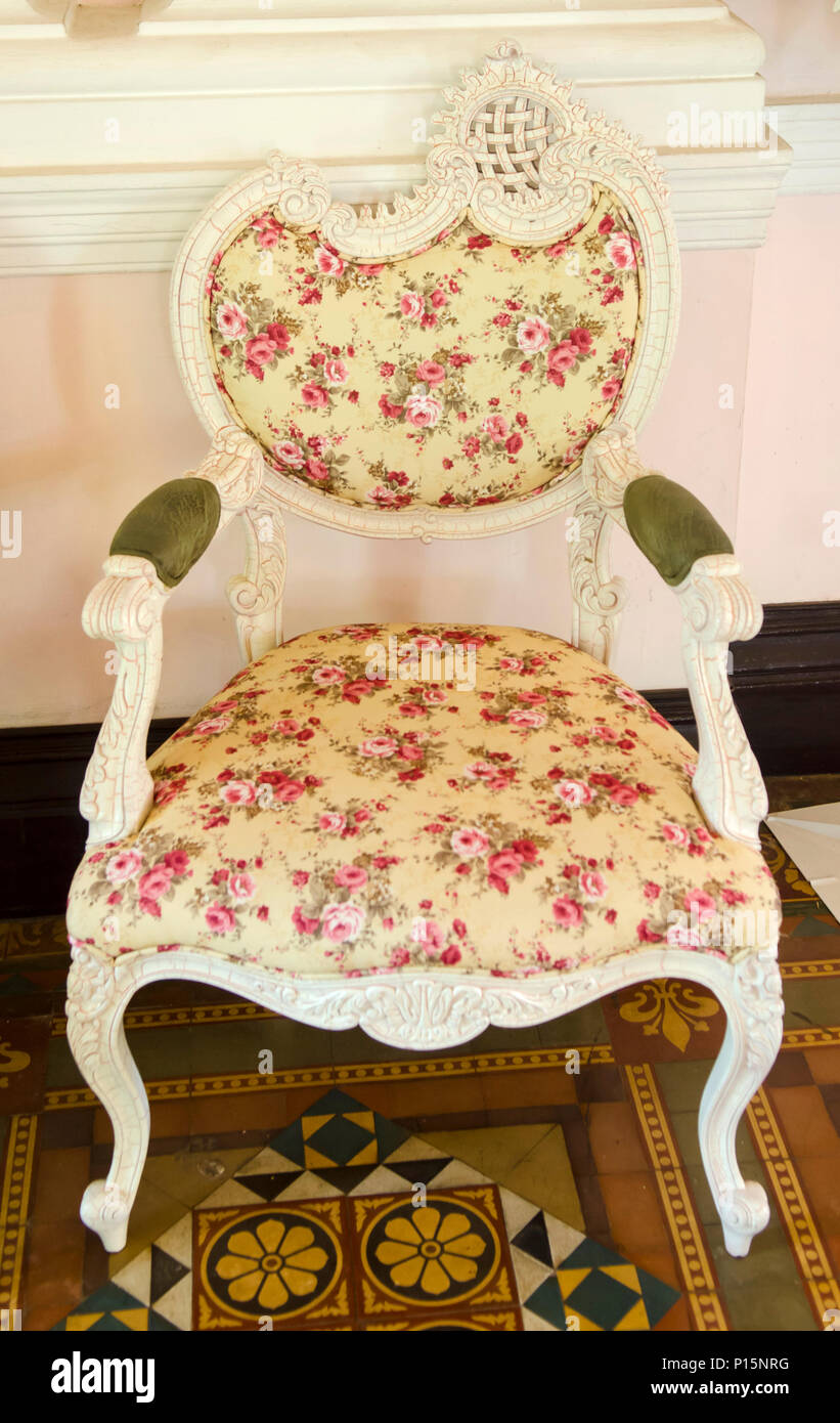 wooden vintage armchair sofa in vintage room Stock Photo - Alamy