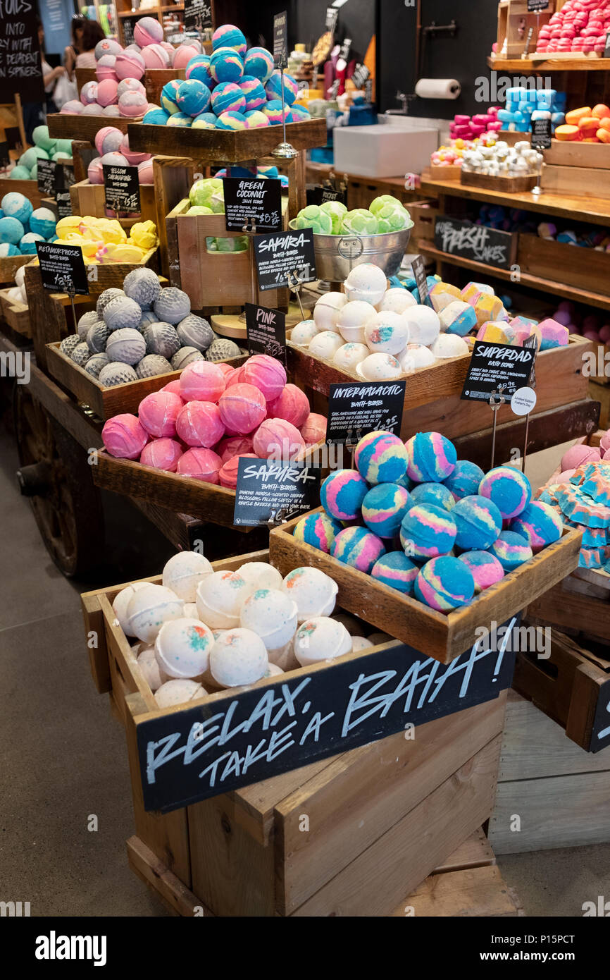 A colourful display of bath soaps for sale at Lush, a handmade organic